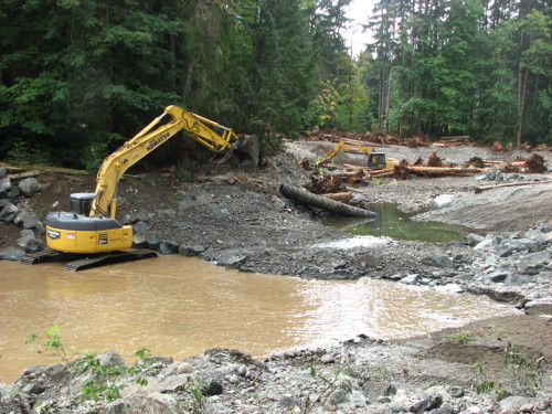 Rosewall Creek Restoration -machine in large brown puddle in creek