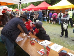 Jens at FB booth w kids