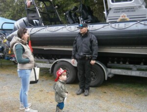 Kid w Fisheries boat