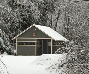 A hatchery is a year round commitment by volunteers who overcome challenges of remoteness, lack of power, the weather to ensure the survival of a wild creek and its salmon inhabitants.